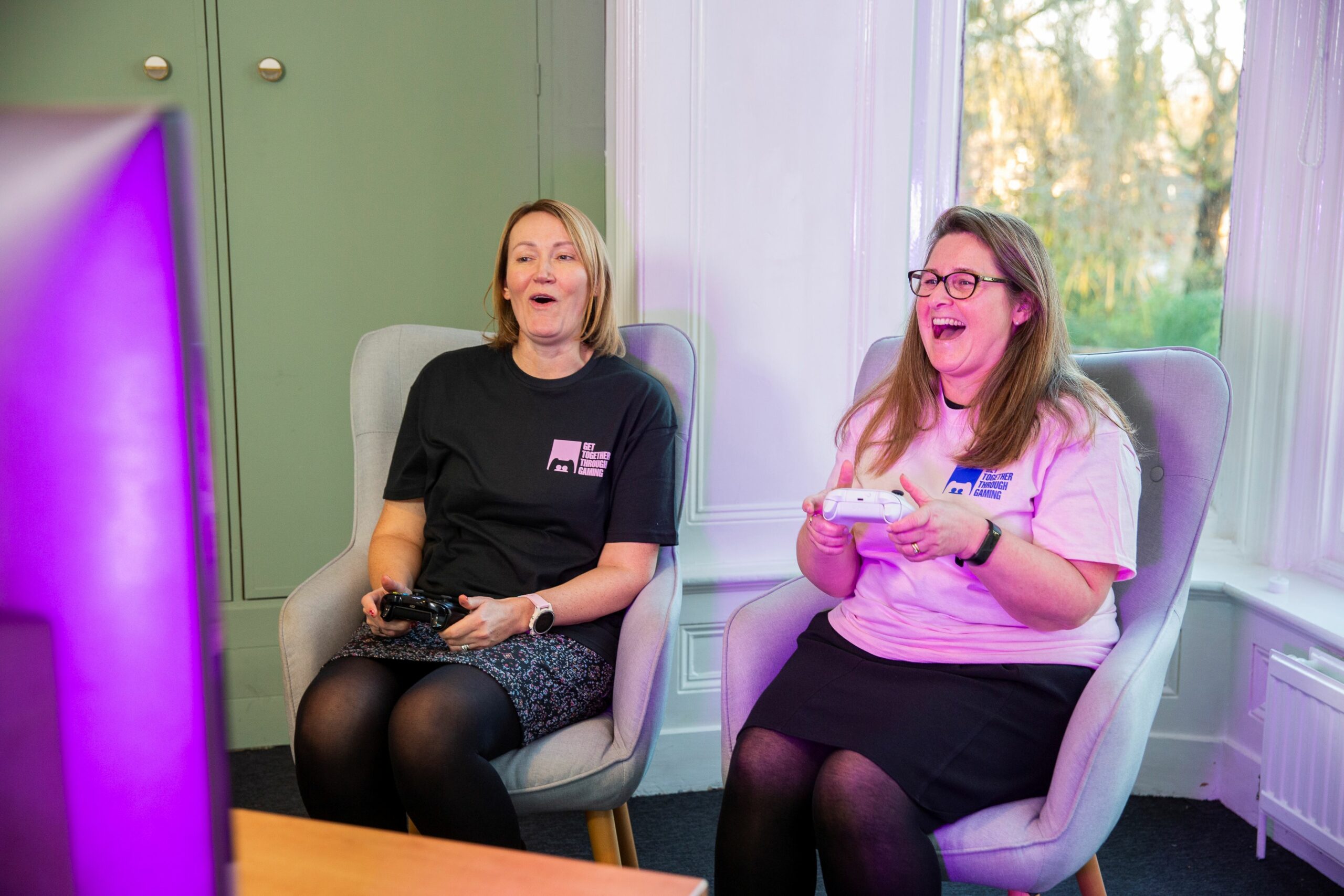 Leeds Mind staff Andrea and Myriam enjoy gaming for Get Together Through Gaming